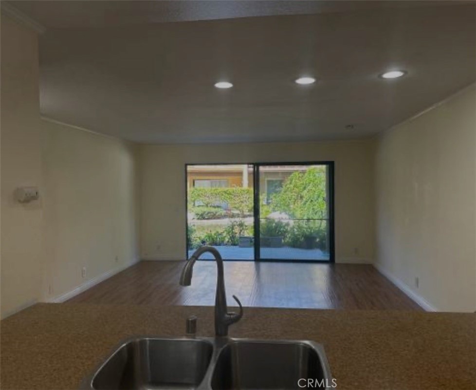 124 Tangelo, Unit 390 Irvine, CA 92618 - Photo 2 of 9 a view of a room with a large window