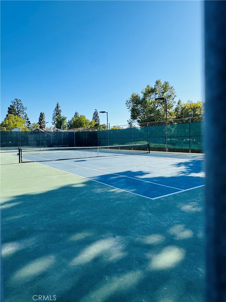 124 Tangelo, Unit 390 Irvine, CA 92618 - Photo 5 of 9 a view of a swimming pool and an outdoor seating