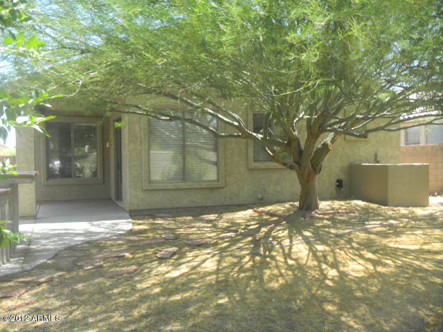 844 South Roca Court Gilbert, AZ 85296 - Photo 14 of 14 a view of a house with a yard