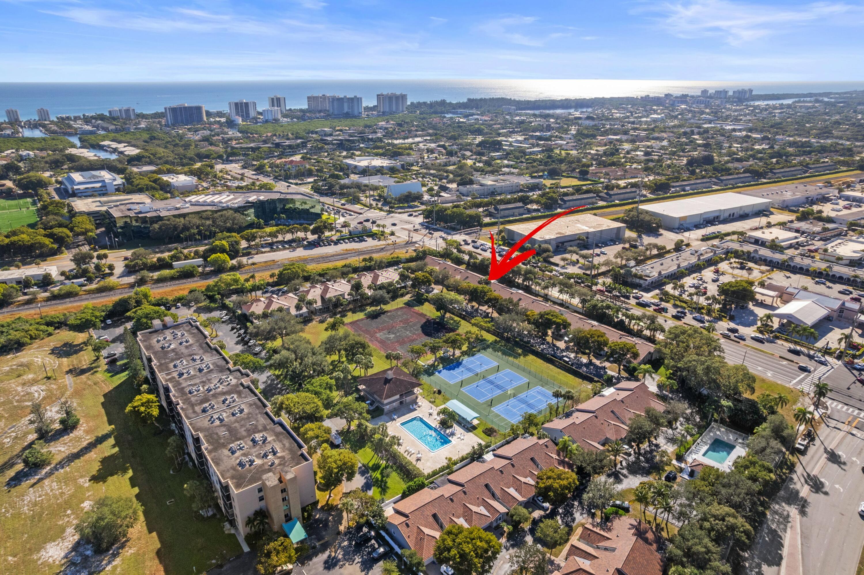 5140 Sabal Gardens Lane, Unit 2 Boca Raton, FL 33487 - Photo 20 of 34 an aerial view of city and lake