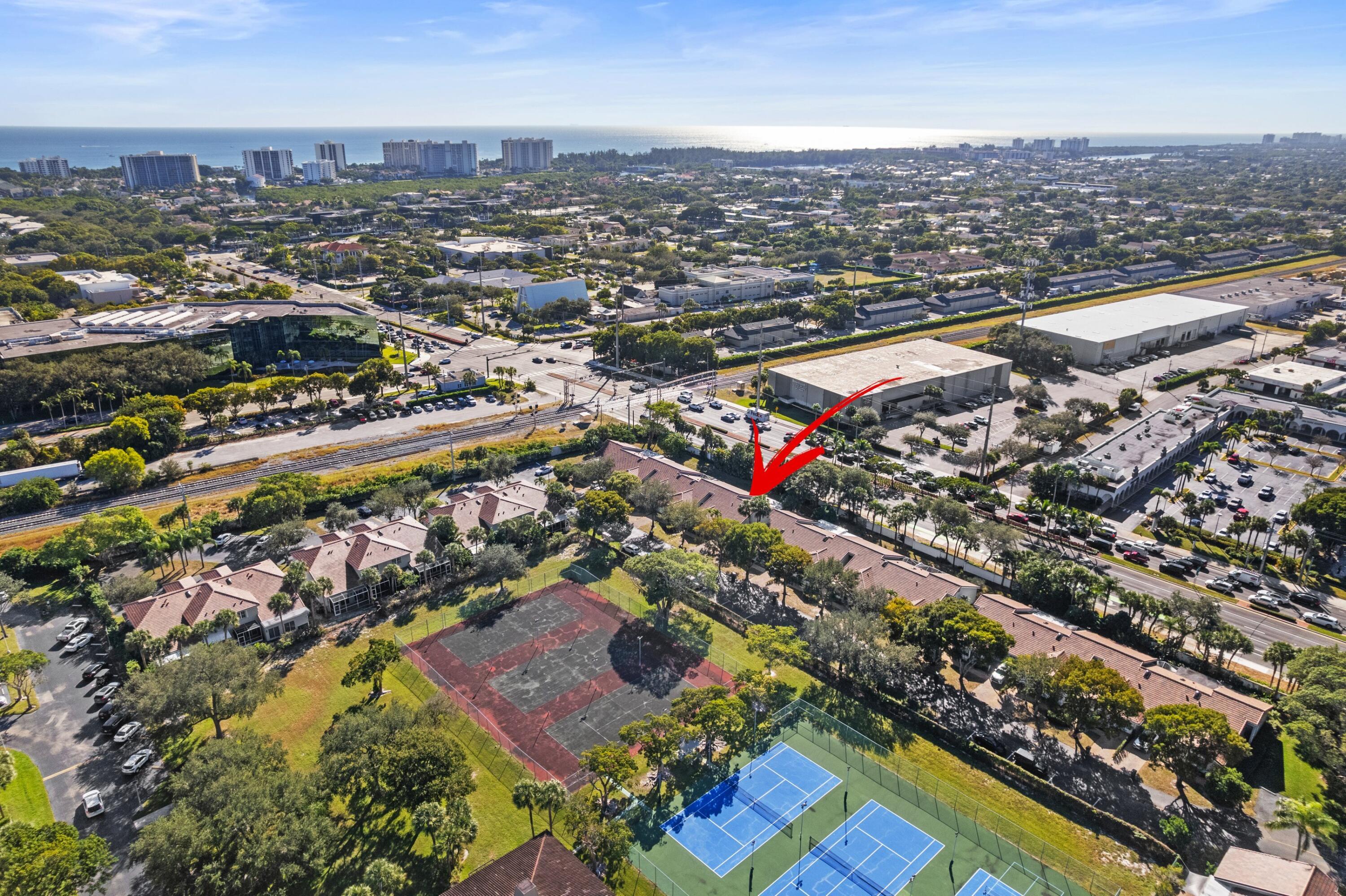 5140 Sabal Gardens Lane, Unit 2 Boca Raton, FL 33487 - Photo 21 of 34 an aerial view of city and lake