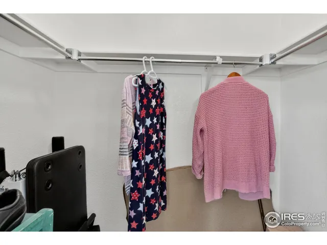 a view of a closet with storage