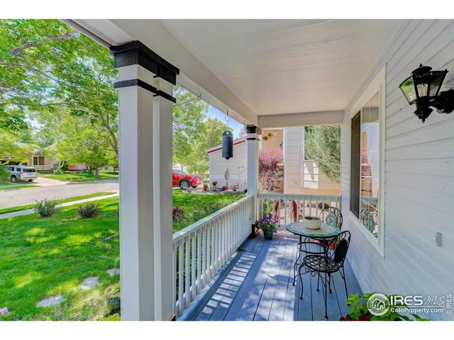 a view of a porch and garden