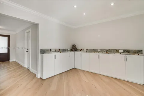 an aerial view of a house with a garden