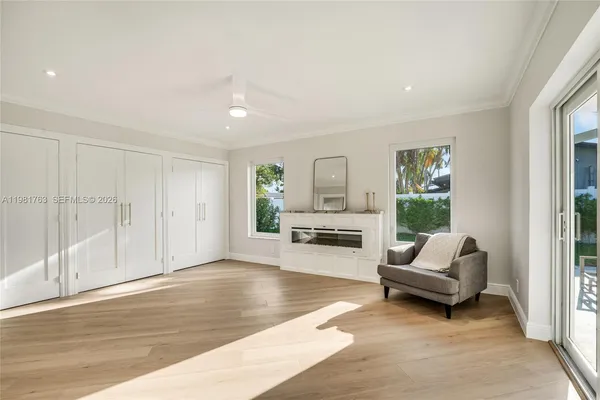 an aerial view of a house with garden space and street view