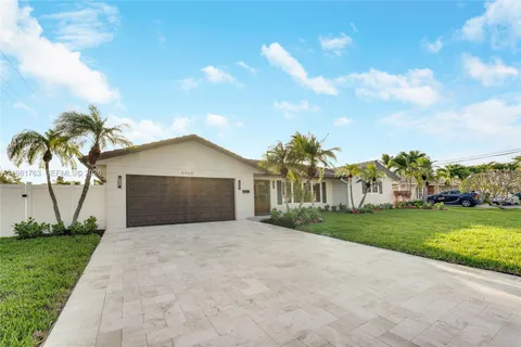 a view of a livingroom with wooden floor