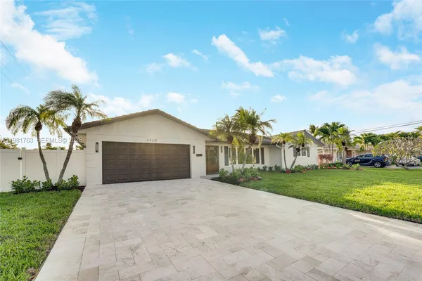 a view of a livingroom with wooden floor
