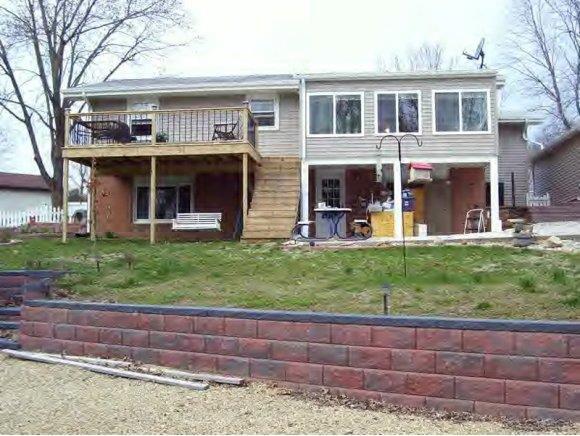 Rr1 Rr1 Rr1 Neoga, IL 62447 - Photo 1 of 1 a front view of a house with garden