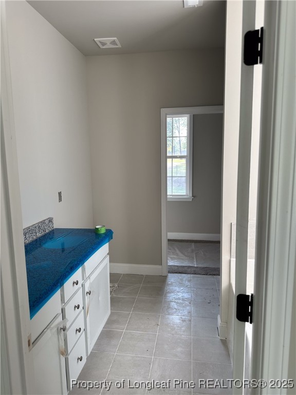 2 Collier Road Wade, NC 28395 - Photo 12 of 18 a bathroom with a sink and mirror