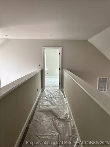 a view of workspace with window and bathroom