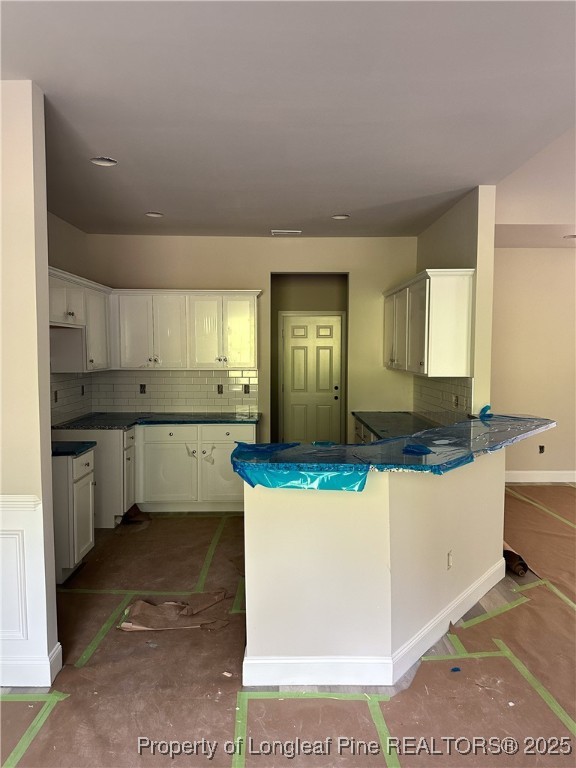 2 Collier Road Wade, NC 28395 - Photo 8 of 18 a kitchen with stainless steel appliances granite countertop a stove a sink and a refrigerator