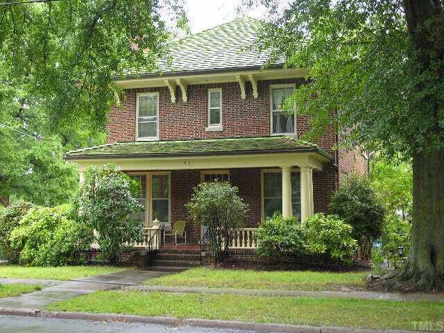 816 Watts Street Durham, NC 27701 - Photo 1 of 1 a front view of a house with garden