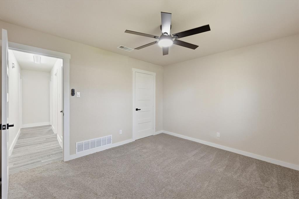 2804 Bent Tree Lane Arlington, TX 76016 - Photo 19 of 32 a view of an empty room