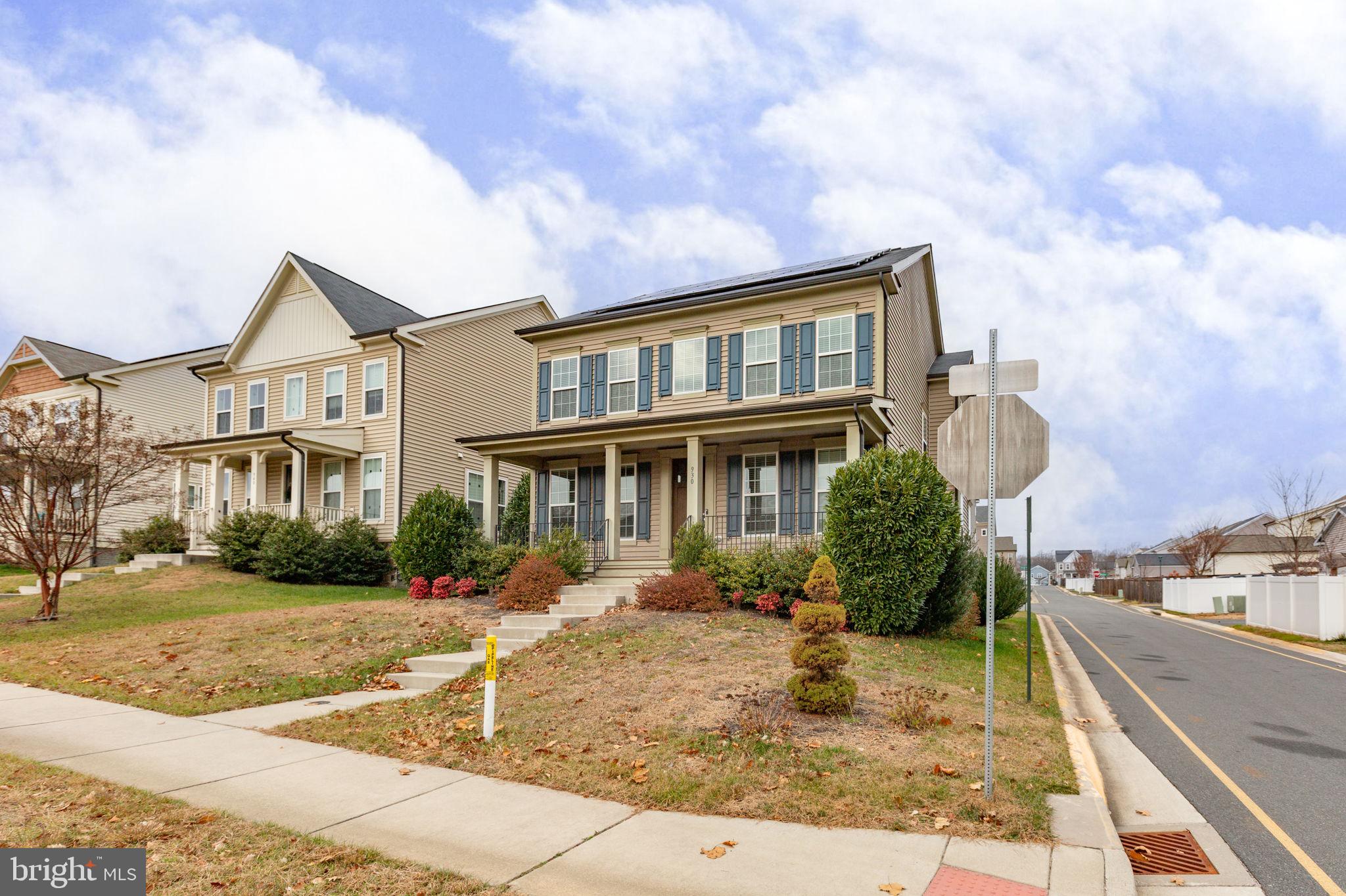 930 Forsythia Lane Stafford, VA 22554 - Photo 2 of 81 a front view of a house with garden and trees