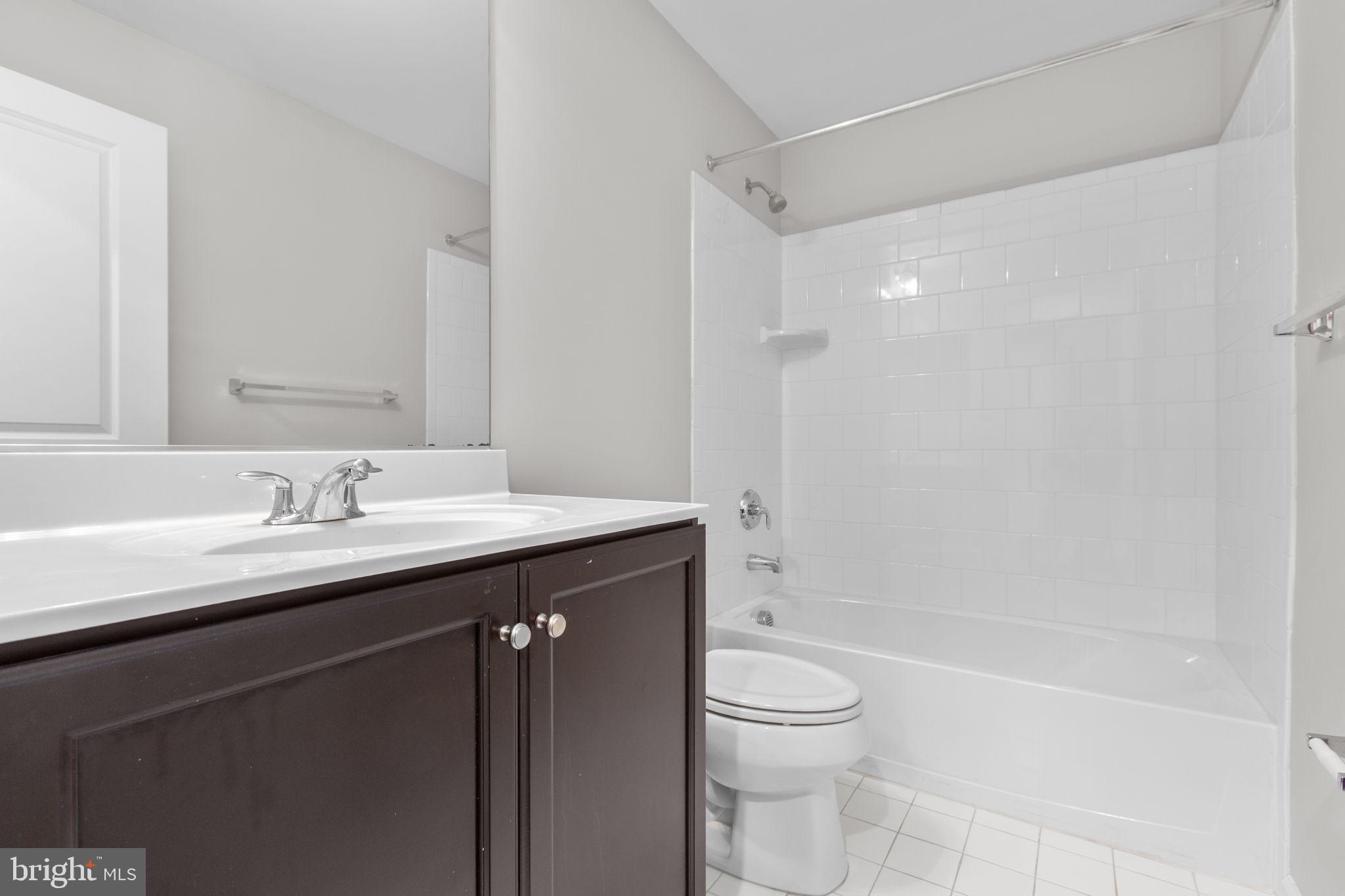 930 Forsythia Lane Stafford, VA 22554 - Photo 48 of 81 a bathroom with a granite countertop sink toilet and shower