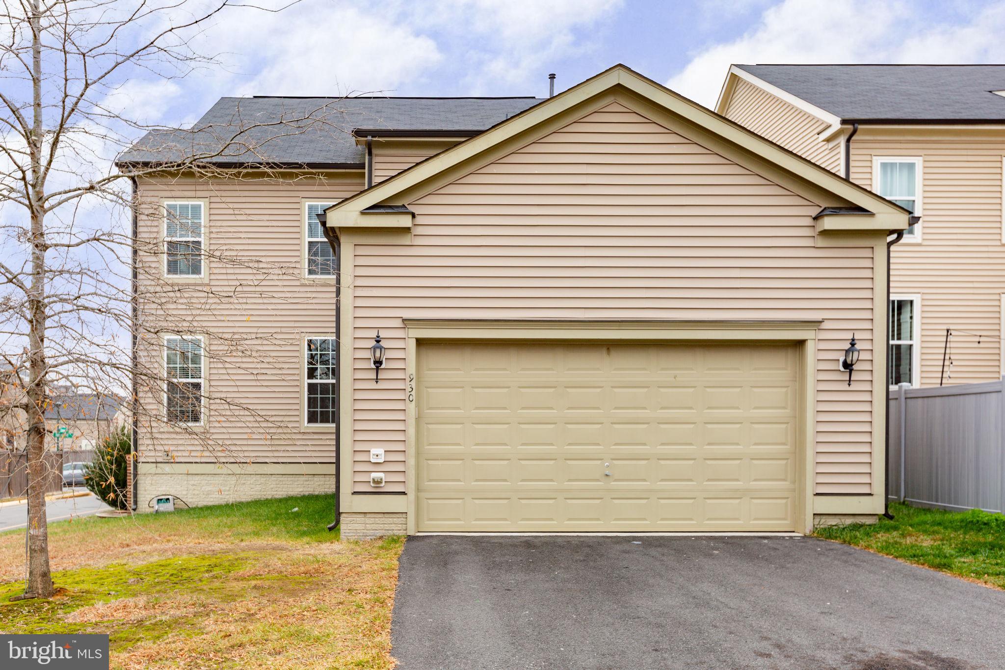 930 Forsythia Lane Stafford, VA 22554 - Photo 55 of 81 a view of a house with a yard and garage
