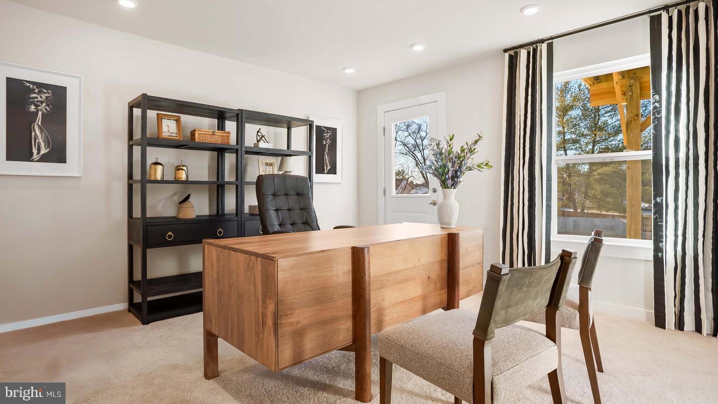 4114 Sherman Avenue Ranson, WV 25438 - Photo 4 of 51 a view of a dining room with furniture window and wooden floor