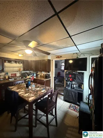 a view of a dining room with furniture