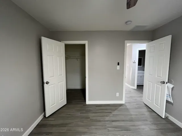 a view of a livingroom with wooden floor