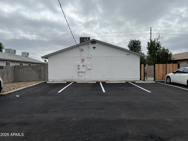 a white house with a outdoor space