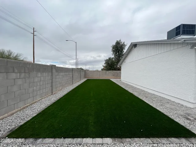 a view of a backyard with plants