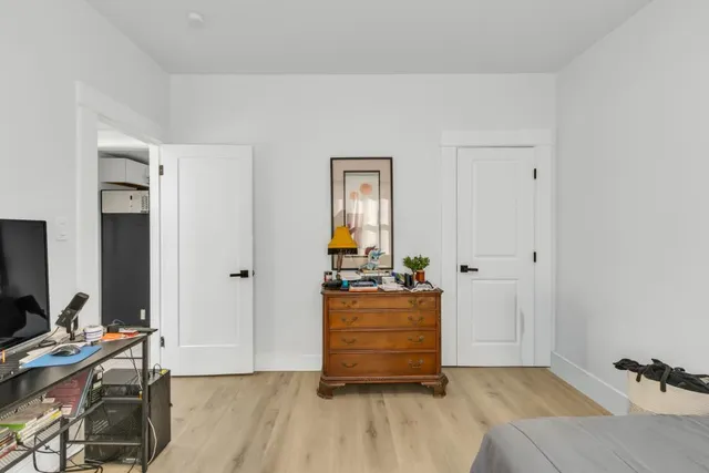 a bathroom with a tub and a sink