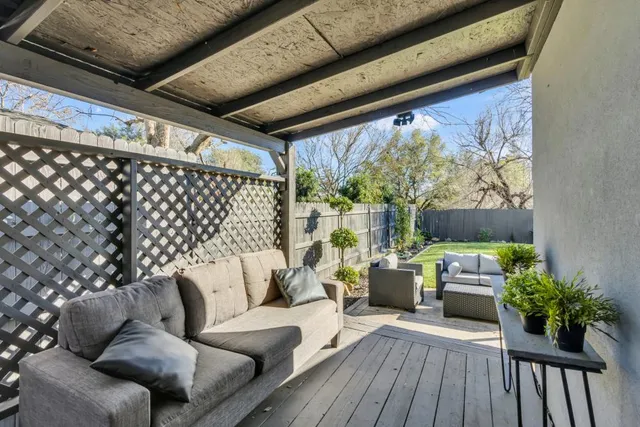 a backyard of a house with seating space