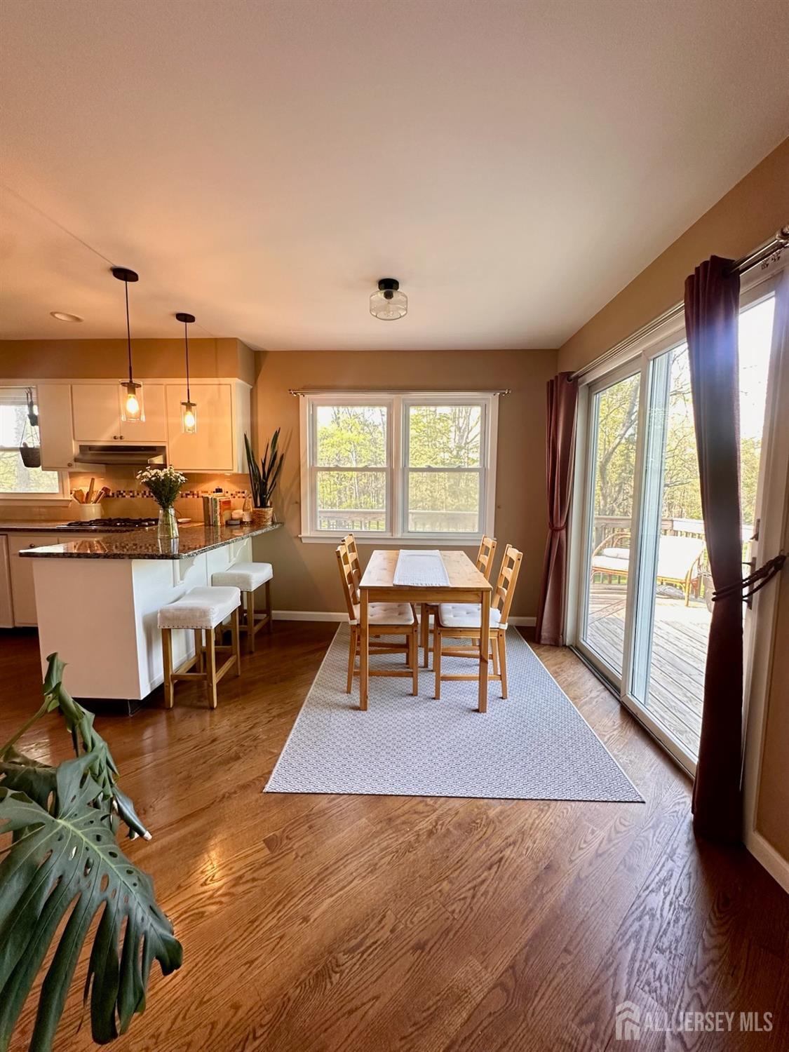 667 Cedarbrook Road Bridgewater, NJ 08807 - Photo 11 of 24 a living room with furniture and a large window