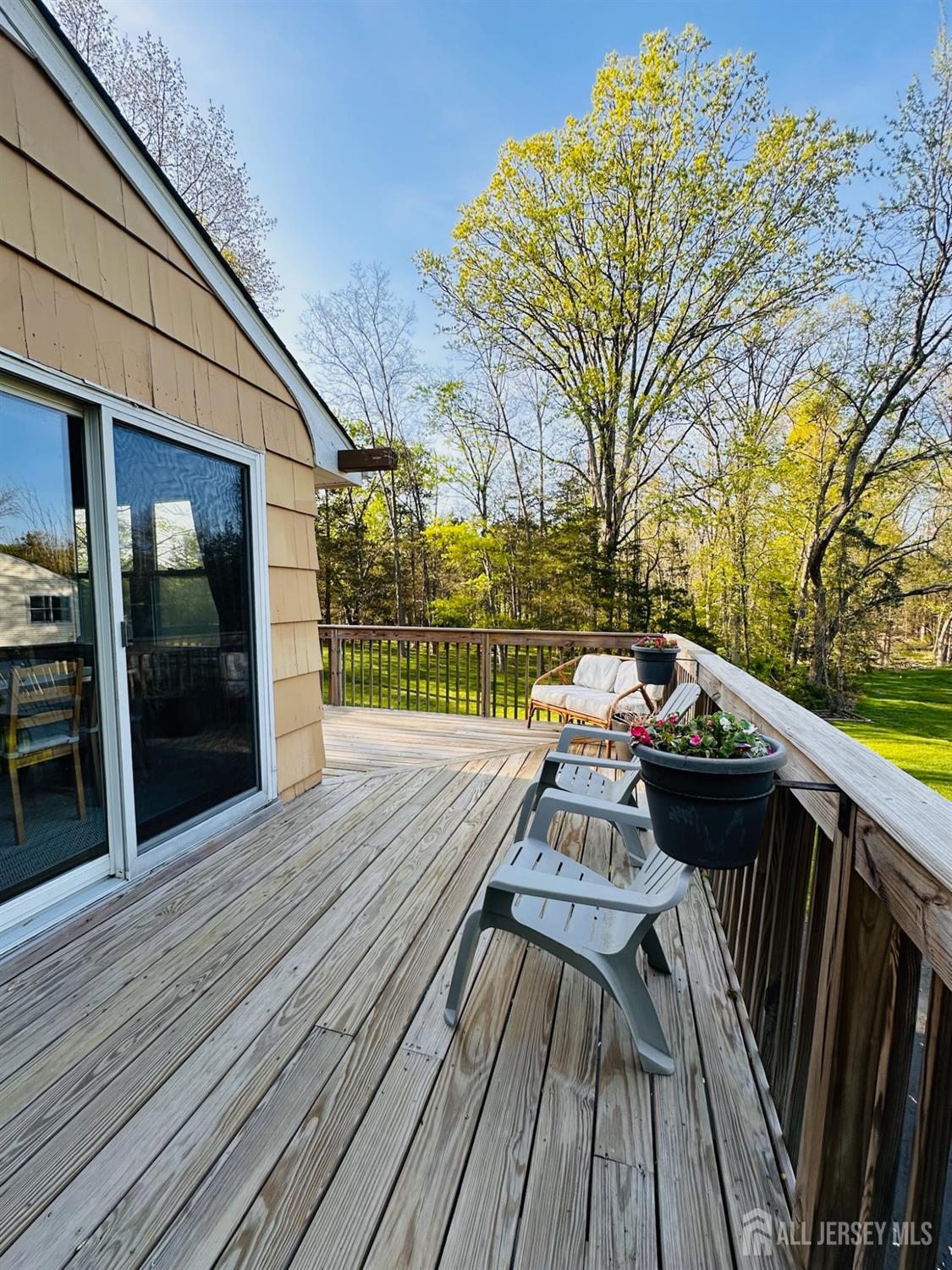 667 Cedarbrook Road Bridgewater, NJ 08807 - Photo 23 of 24 a view of deck with patio
