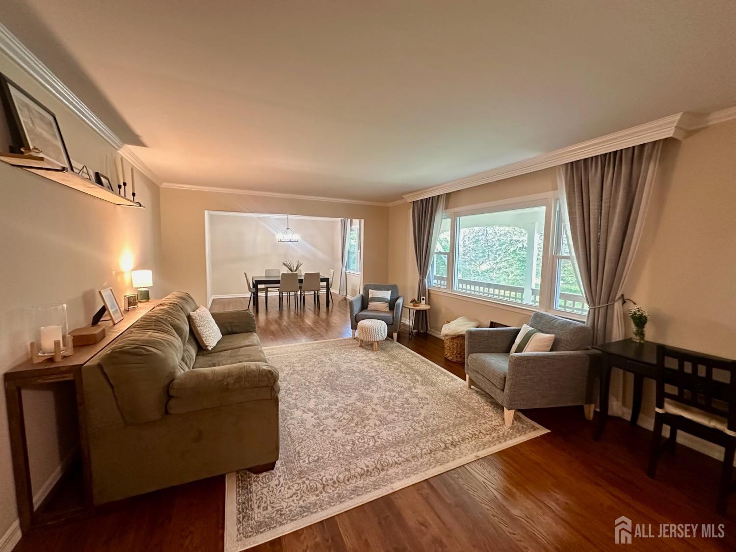 667 Cedarbrook Road Bridgewater, NJ 08807 - Photo 7 of 24 a living room with furniture and a large window