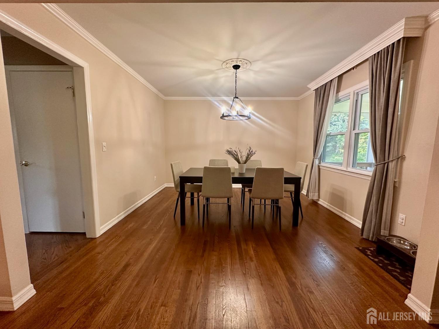 667 Cedarbrook Road Bridgewater, NJ 08807 - Photo 8 of 24 a view of a dining room with furniture window and wooden floor