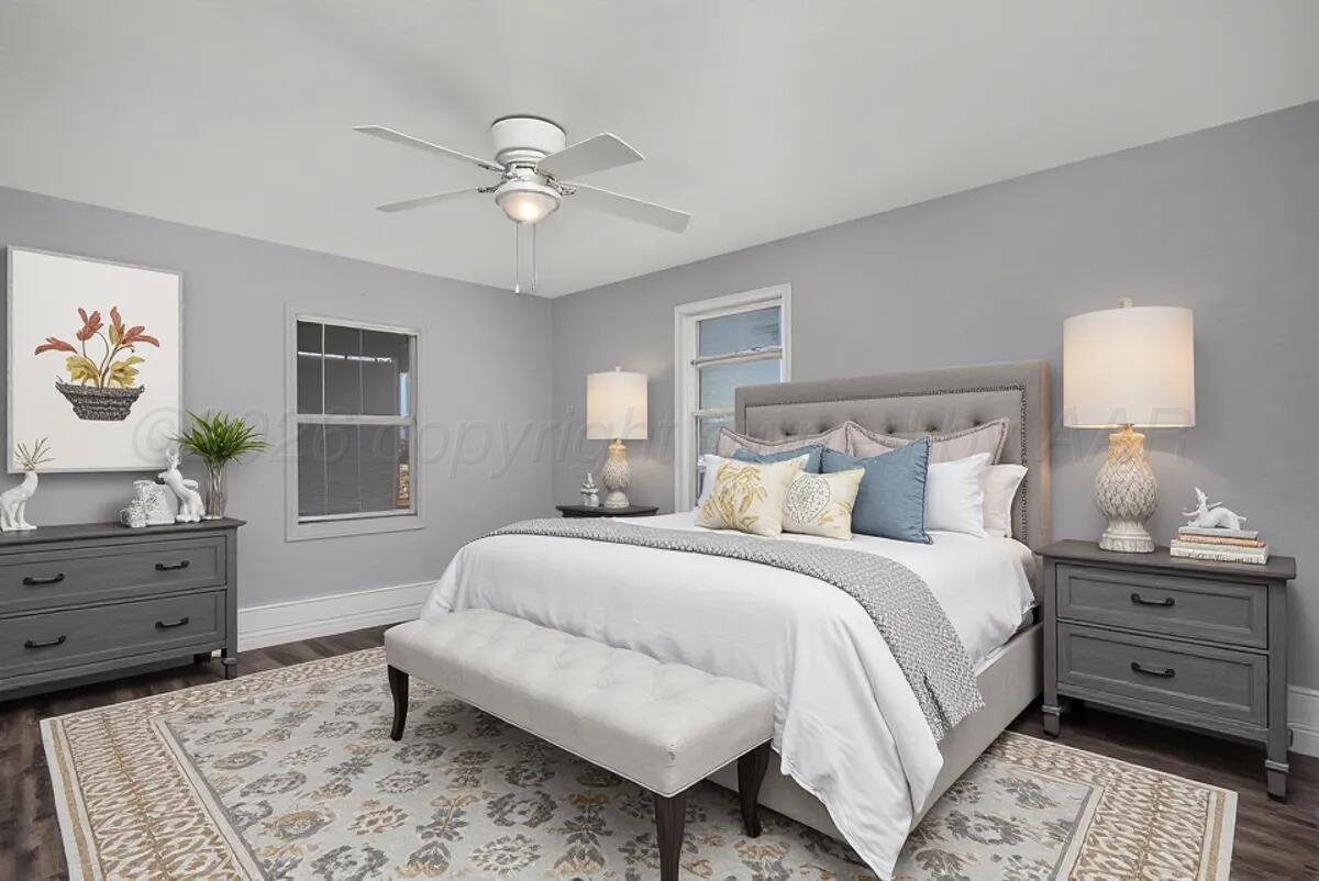 1108 North Madison Street Amarillo, TX 79107 - Photo 11 of 22 a bedroom with a bed and a dresser