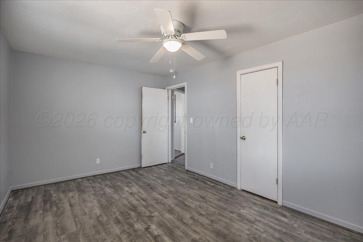 1108 North Madison Street Amarillo, TX 79107 - Photo 11 of 21 wooden floor in an empty room