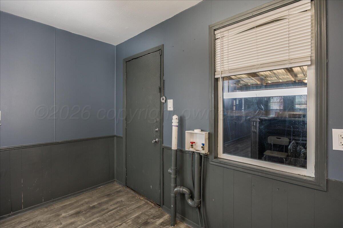 1108 North Madison Street Amarillo, TX 79107 - Photo 16 of 22 a view of a bathroom from a hallway