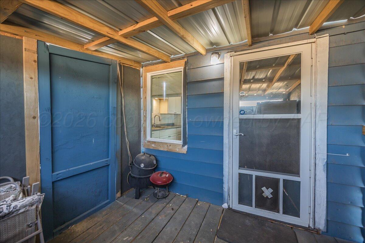 1108 North Madison Street Amarillo, TX 79107 - Photo 17 of 22 a view of a room with wooden floor and cabinets