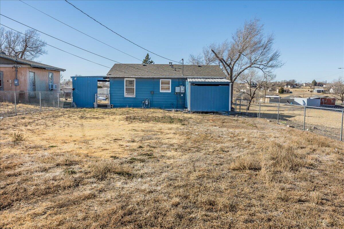1108 North Madison Street Amarillo, TX 79107 - Photo 19 of 22 a view of house with yard