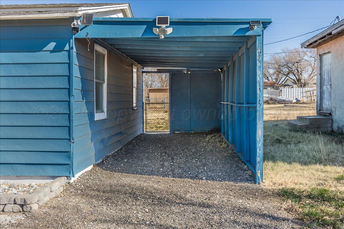 1108 North Madison Street Amarillo, TX 79107 - Photo 21 of 22 a view of house with backyard
