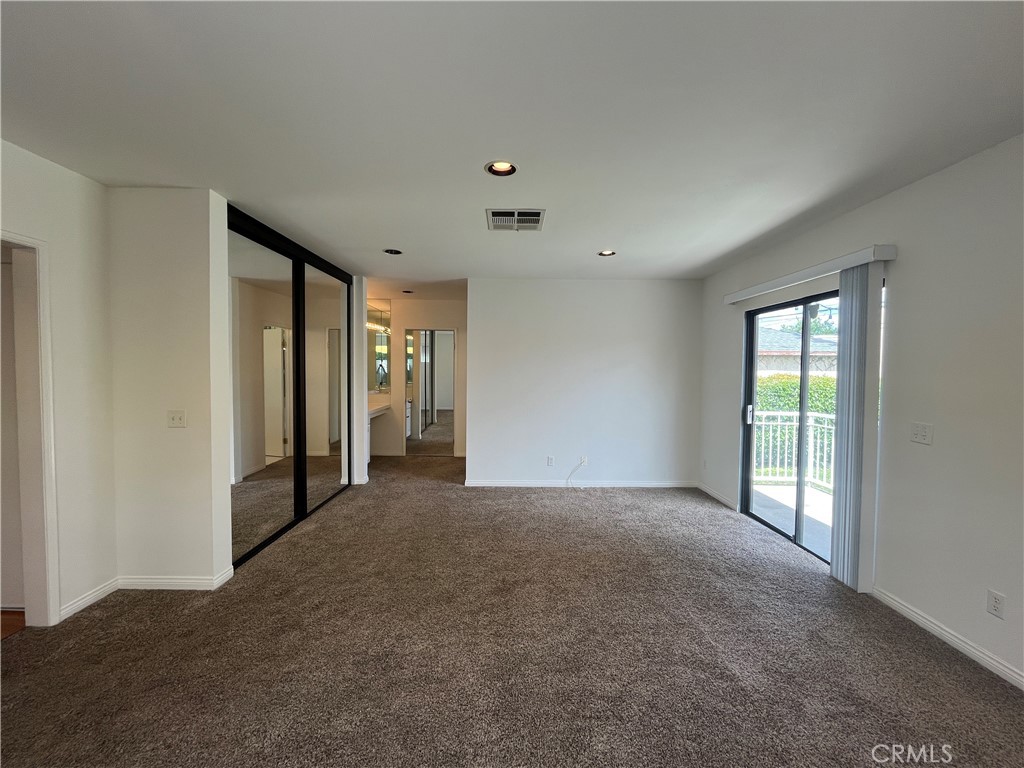 18029 Santa Rita Street Encino, CA 91316 - Photo 13 of 20 a view of an empty room with large window