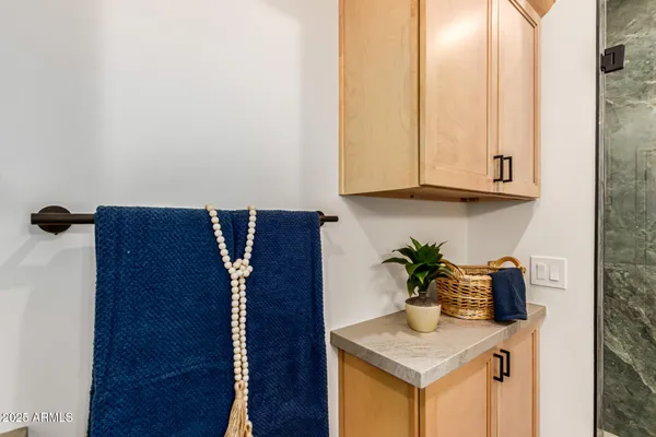 a kitchen with a washer and dryer