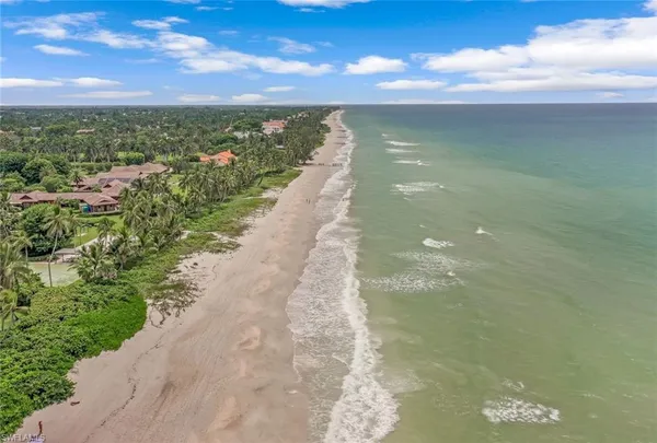 a view of a lake with a yard