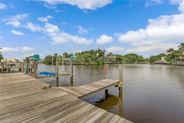 a view of a lake with sitting area