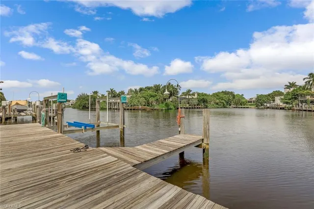 a view of a lake with sitting area