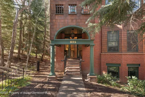 a front view of a house with yard