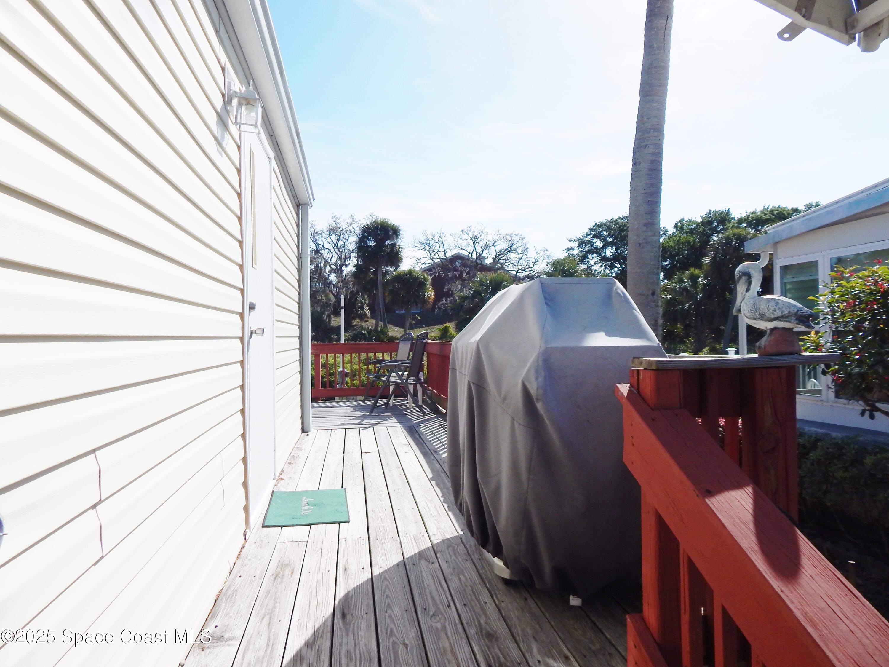 3016 Indian River Drive Northeast Palm Bay, FL 32905 - Photo 7 of 27 a view of balcony and deck