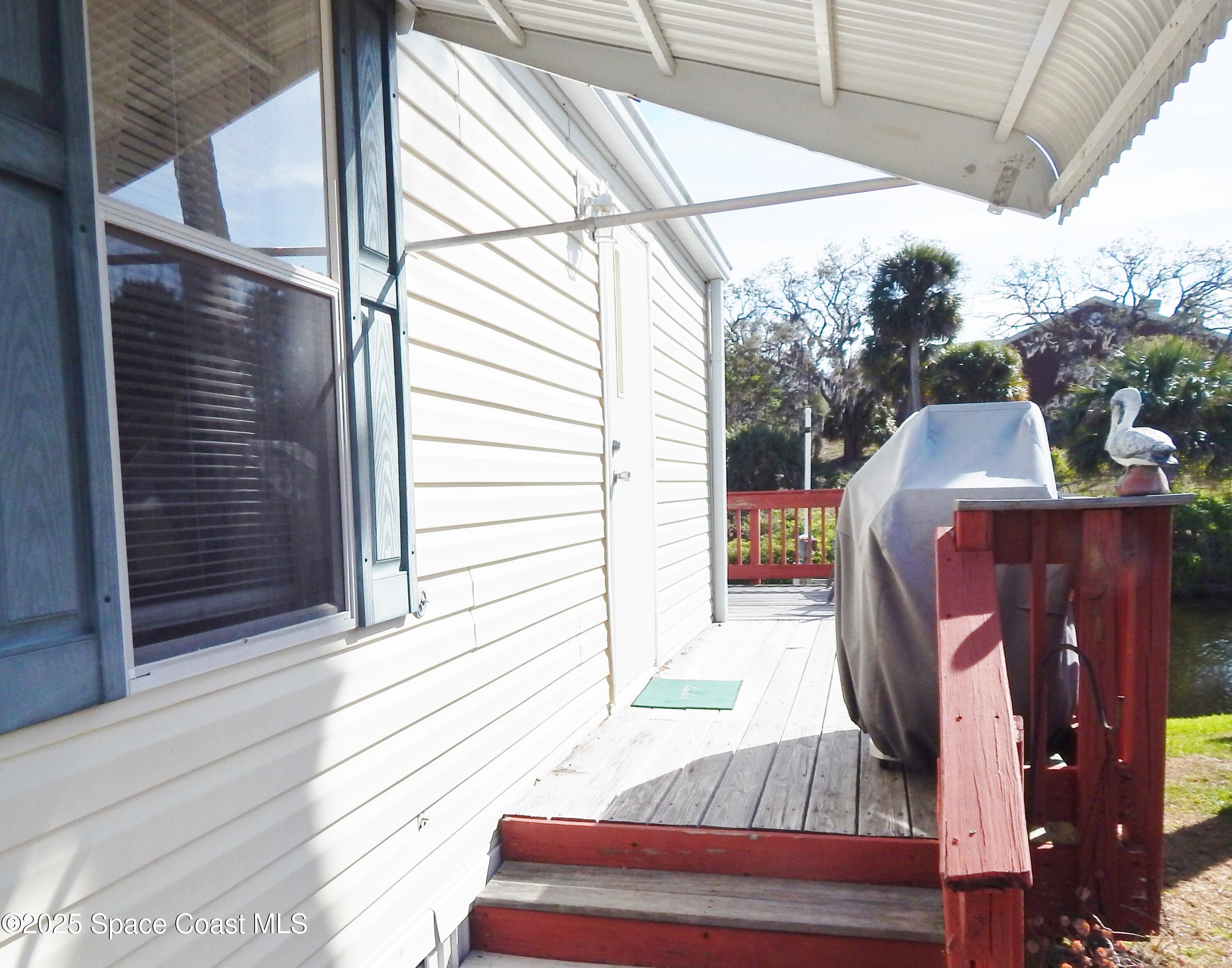3016 Indian River Drive Northeast Palm Bay, FL 32905 - Photo 8 of 27 a view of outdoor space with seating space