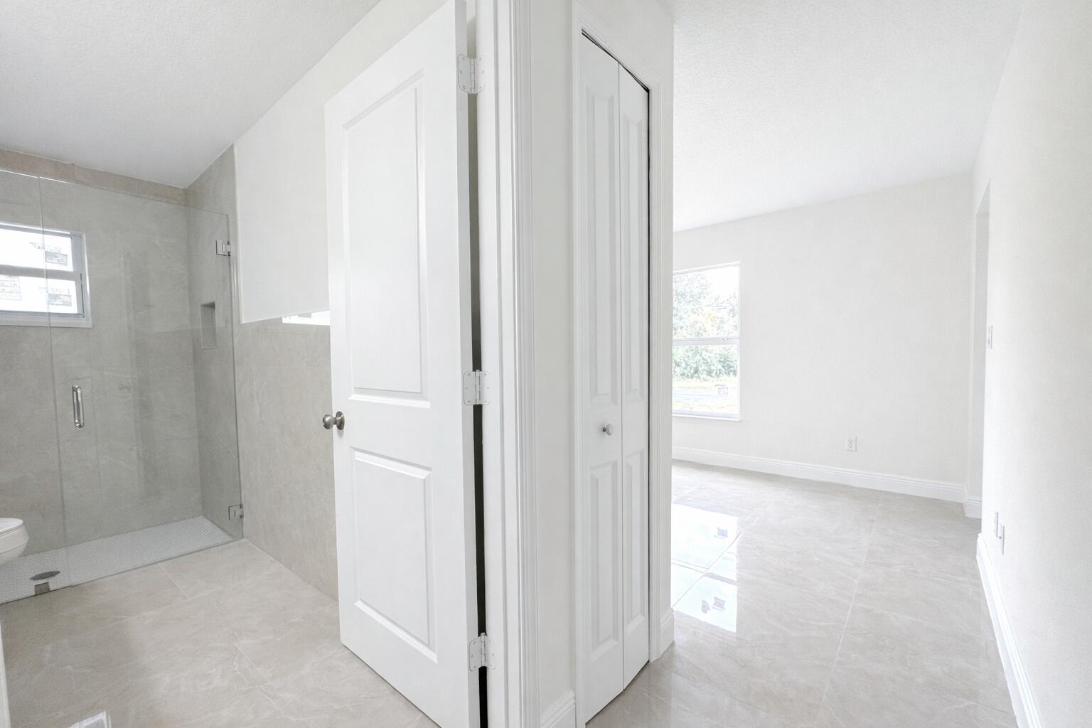 655 Southwest Seagull Terrace Port St. Lucie, FL 34953 - Photo 18 of 24 a view of an empty room