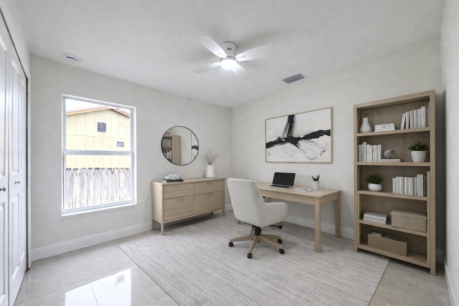 655 Southwest Seagull Terrace Port St. Lucie, FL 34953 - Photo 21 of 24 a very nice looking room with a desk and a window