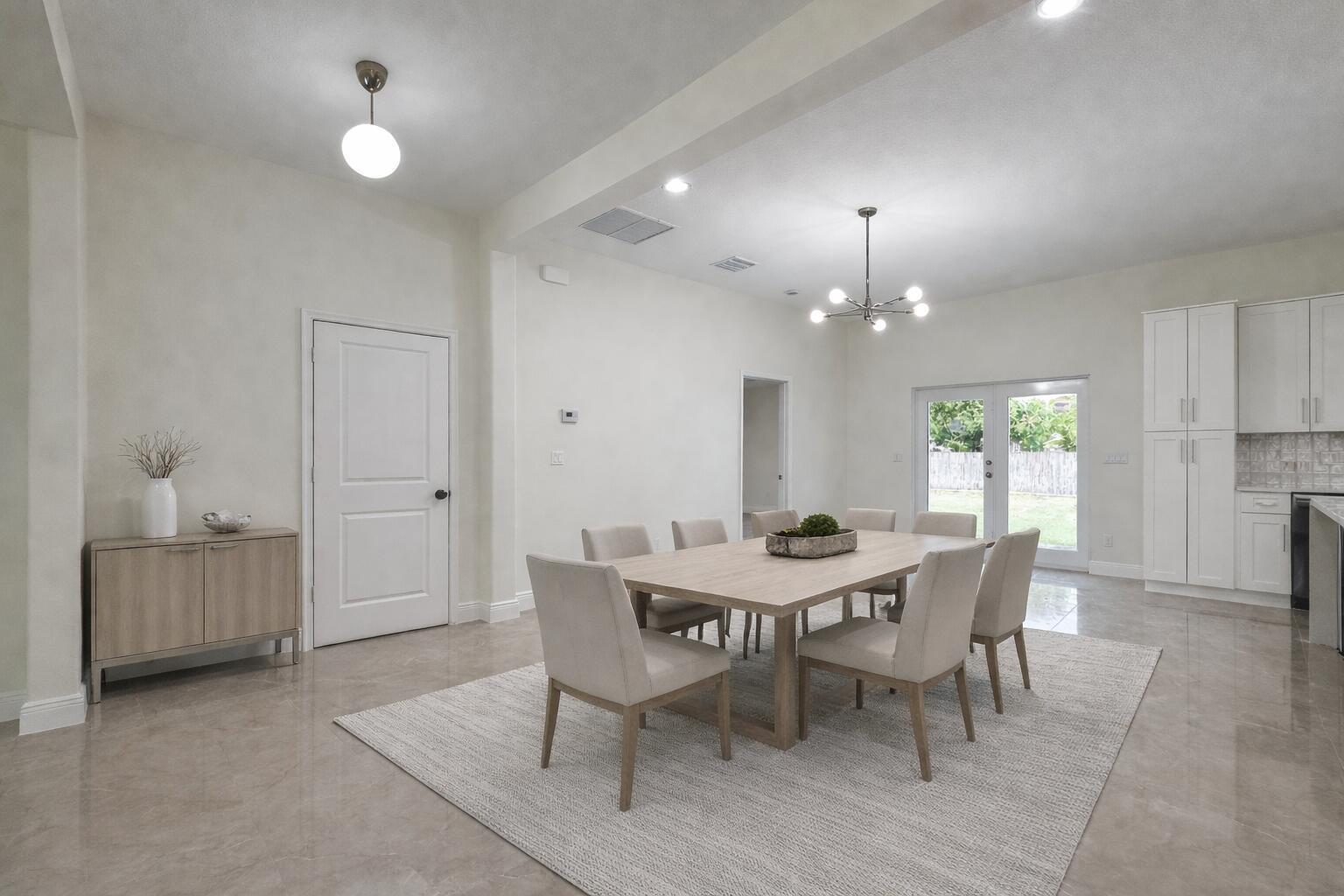 655 Southwest Seagull Terrace Port St. Lucie, FL 34953 - Photo 9 of 24 a view of a dining room with furniture and window