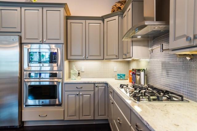 16 Clipper Street Inlet Beach, FL 32461 - Photo 20 of 34 a kitchen with stainless steel appliances a stove a sink and a microwave