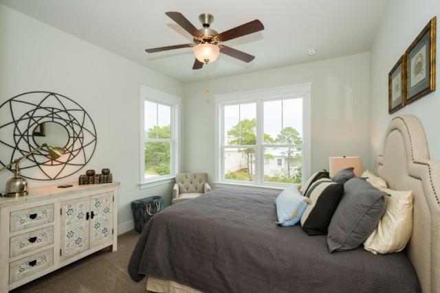 16 Clipper Street Inlet Beach, FL 32461 - Photo 6 of 34 a bedroom with a bed a window and dresser
